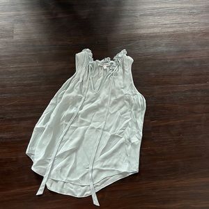 Light blue blouse with front tie, by Elizabeth and James